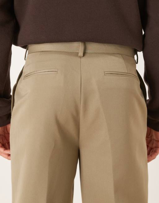 ASOS DESIGN tailored pleated oversized tapered pants and exposed button in khaki, 5 of 5