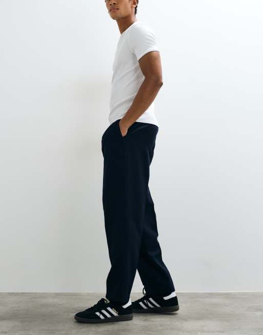 ASOS DESIGN tailored pleated oversized tapered pants in navy microtexture, 4 of 5