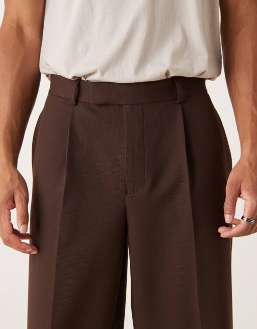 ASOS DESIGN tailored pleated oversized tapered textured trousers in brown, 4 of 5