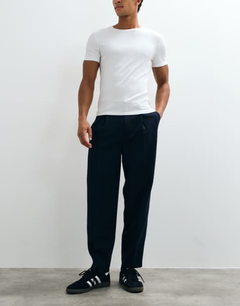 ASOS DESIGN tailored pleated oversized tapered trousers in navy microtexture - view 1