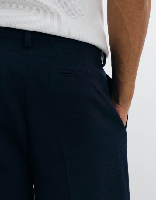 ASOS DESIGN tailored pleated oversized tapered trousers in navy microtexture, 3 of 5