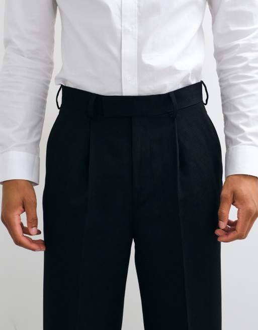 ASOS DESIGN tailored pleated relaxed tapered pants in black microtexture, 3 of 5