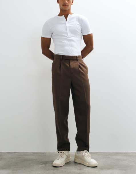 ASOS DESIGN tailored pleated relaxed tapered pants in brown microtexture - view 1