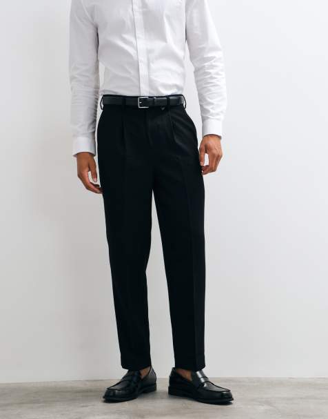 ASOS DESIGN tailored pleated relaxed tapered trousers in black microtexture - view 1