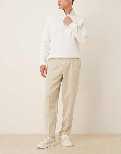 ASOS DESIGN tailored pleated relaxed tapered trousers in ecru, 2 of 5