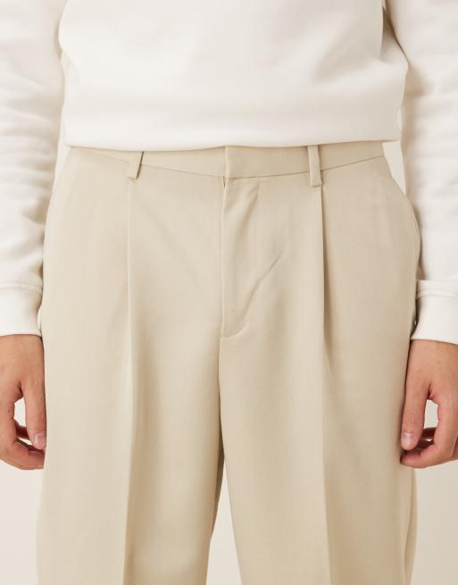 ASOS DESIGN tailored pleated relaxed tapered trousers in ecru, 4 of 5
