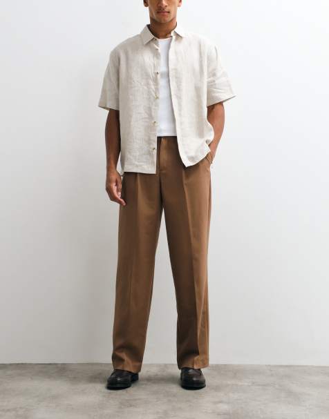 ASOS DESIGN tailored pleated wide leg trousers in warm brown - view 1
