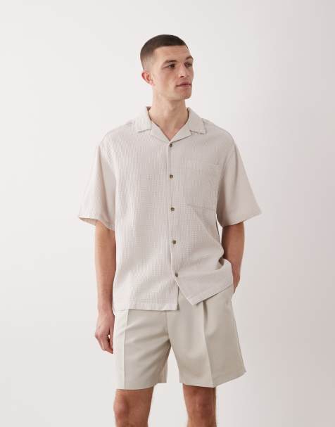 ASOS DESIGN tailored pleated wide shorts in ecru - view 1
