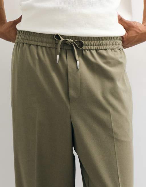 ASOS DESIGN tailored pull on comfort stretch relaxed tapered trousers in khaki twill, 5 of 5