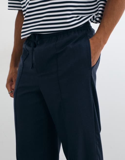 ASOS DESIGN tailored pull on flannel relaxed tapered pants in navy, 5 of 5