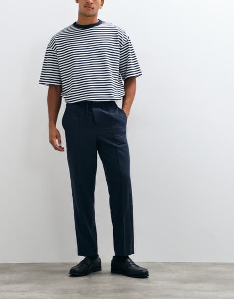 ASOS DESIGN tailored pull on flannel relaxed tapered trousers in navy - view 1