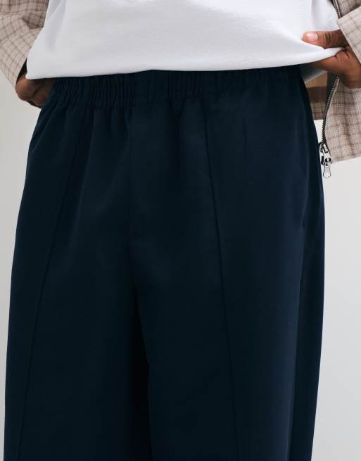 ASOS DESIGN tailored pull on oversized tapered pants in navy, 4 of 5