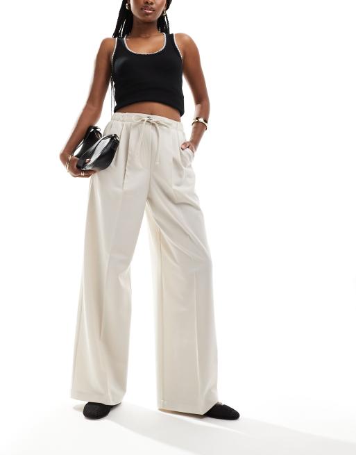 ASOS DESIGN tailored pull on pants in stone 