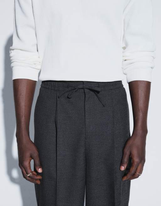 ASOS DESIGN tailored pull on relaxed tapered trousers in charcoal microtexture, 5 of 5