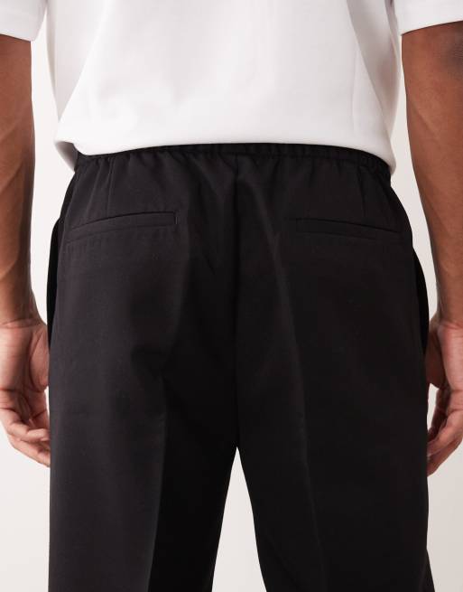 ASOS DESIGN tailored pull on tapered pants in black, 4 of 5