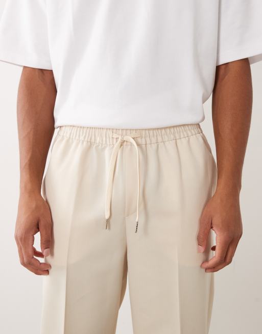ASOS DESIGN tailored pull on tapered pants in ecru, 2 of 5