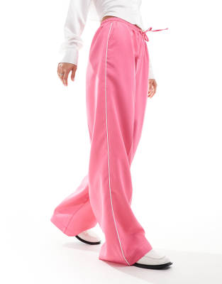 ASOS DESIGN tailored pull on trouser with piping in pink