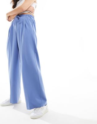 ASOS DESIGN tailored pull on trousers in blue-Brown