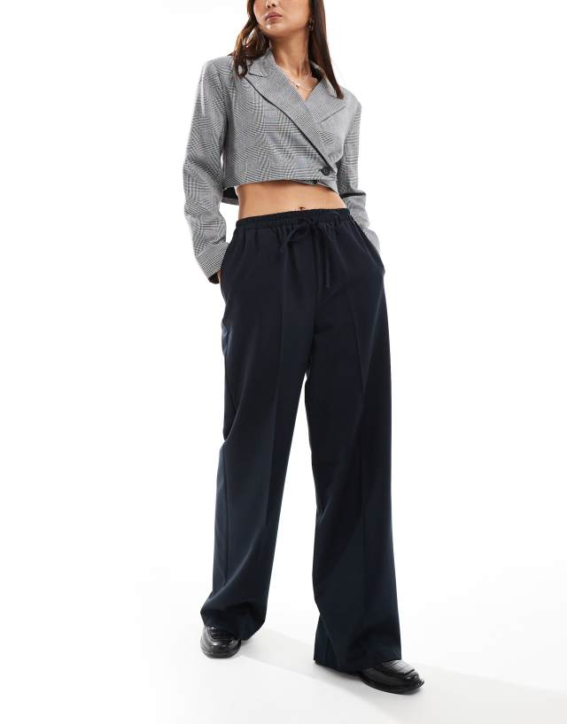 ASOS DESIGN - tailored pull on trousers in navy