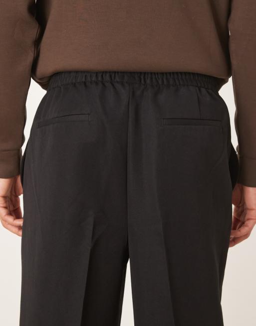 ASOS DESIGN tailored relaxed tapered jogger in black, 4 of 5