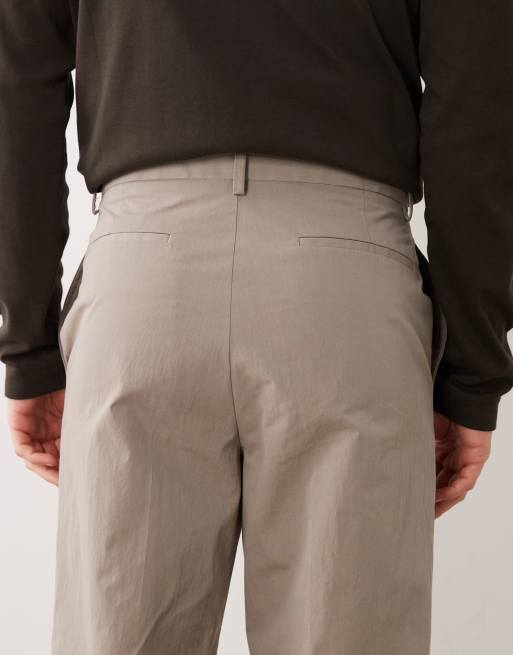 ASOS DESIGN tailored relaxed tapered pants in khaki paper touch tech fabric, 4 of 5