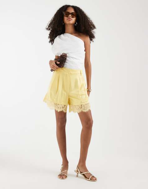 ASOS DESIGN tailored satin shorts with lace trim in buttermilk