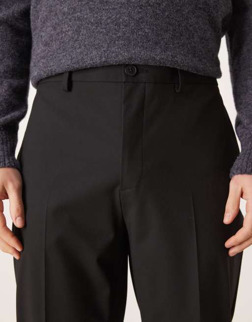ASOS DESIGN tailored tapered comfort stretch trousers in black twill with elasticated waist, 4 of 5