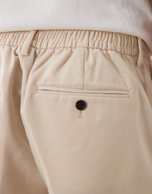 ASOS DESIGN tailored tapered pants in ecru with elasticated waist and turnup, 4 of 5