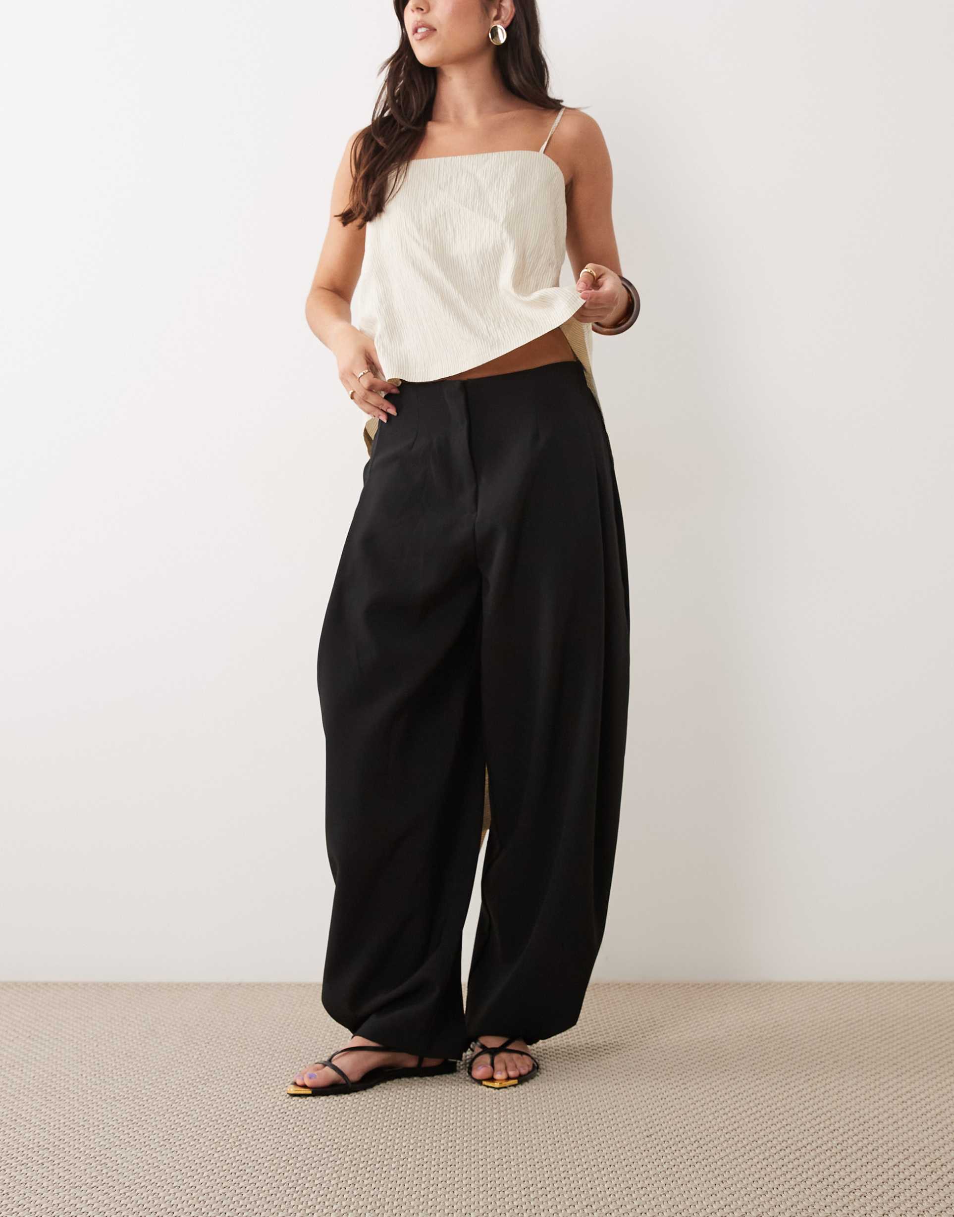 asos design tailored tapered pants with snap hem detail in black
