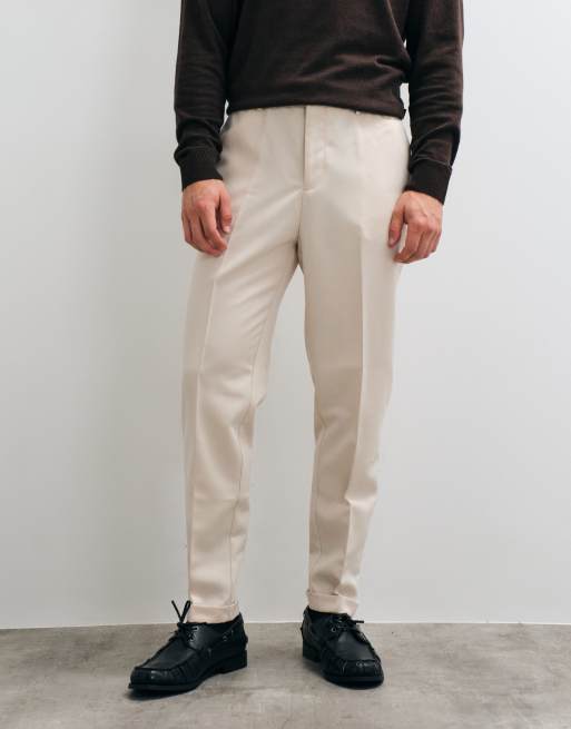 ASOS DESIGN tailored tapered trousers in ecru with elasticated waist and turnup, 3 of 5