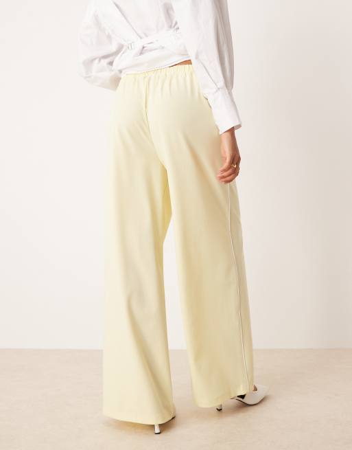 ASOS DESIGN tailored trackies with tipping side seam in lemon, 4 of 5