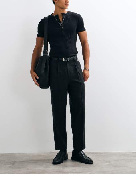 ASOS DESIGN tailored wool blend relaxed tapered trousers in black herringbone - view 1