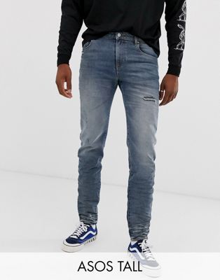 ASOS DESIGN Tall - 12.5oz jeans met smaltoelopende pijpen en slijtage-effect in midwash blauw