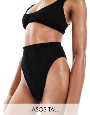 ASOS DESIGN Tall - Amy - Mix and Match - Bikinihose in Schwarz mit Knitterstruktur, hohem Beinausschnitt und hohem Bund