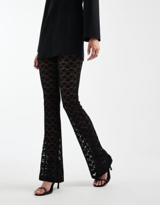 ASOS DESIGN Tall - Ausgestellte Hose aus transparenter Spitze in Schwarz