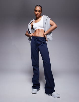 ASOS DESIGN Tall - Ausgestellte Jogginghose in Marineblau aus Interlock-Stoff
