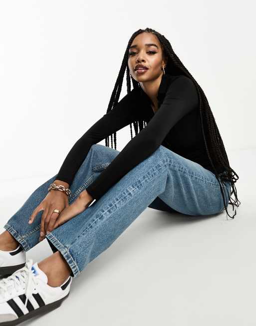 ASOS DESIGN Tall flared jeans in mid blue