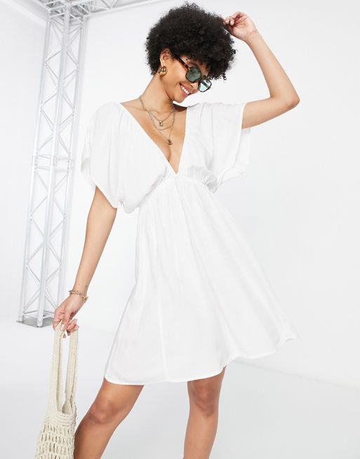 ASOS DESIGN Tall – Biała sukienka plażowa mini z rozszerzanymi rękawami |  ASOS