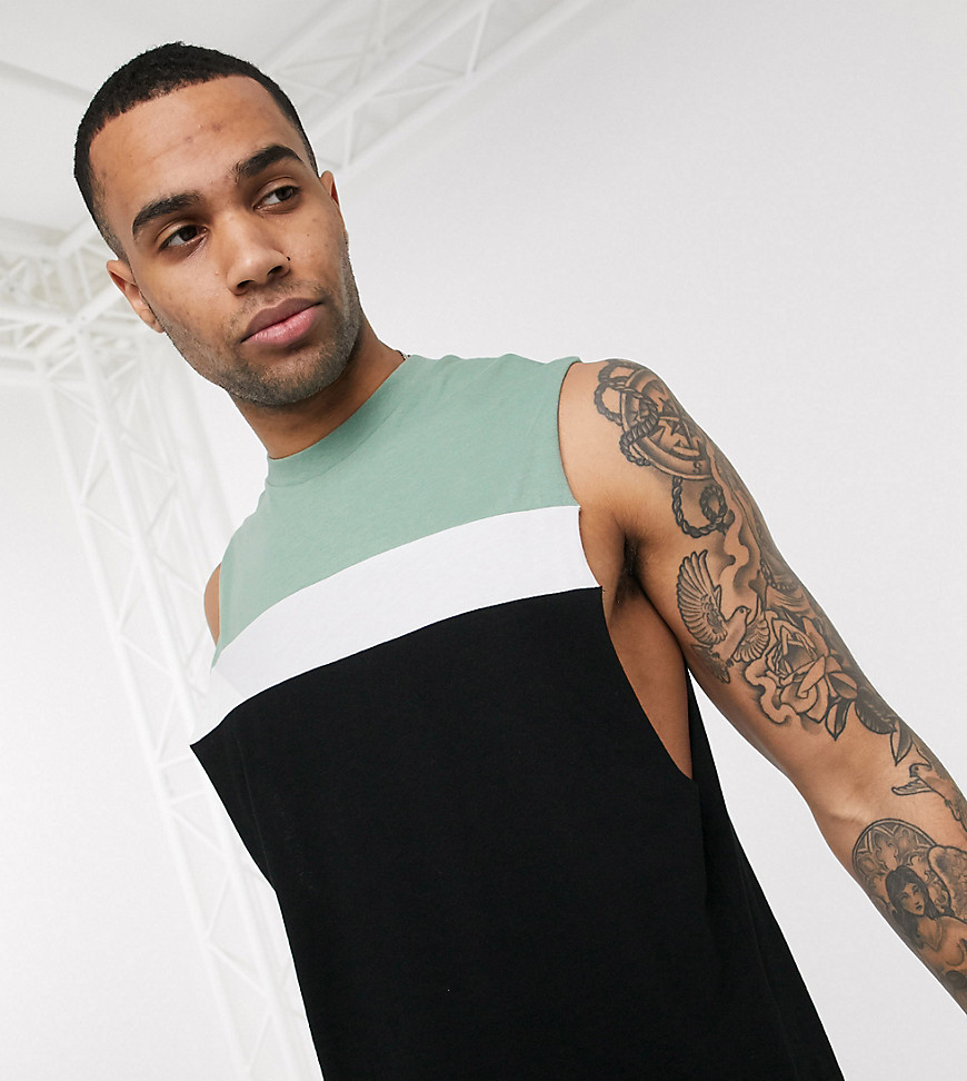 ASOS DESIGN Tall – Blockfärgad ärmlös t-shirt i avslappnad modell med lågt skuret ärmhål-Svart