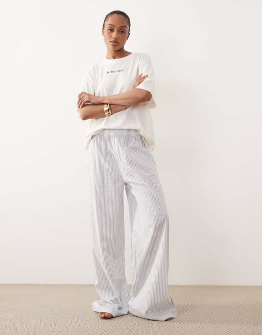 ASOS DESIGN Tall breakfast in bed embroidered oversized short sleeve top & woven stripe trouser pyjama set in blue, 3 of 4