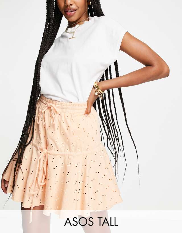 ASOS Tall - ASOS DESIGN Tall broderie tiered mini skirt with tie detail in apricot