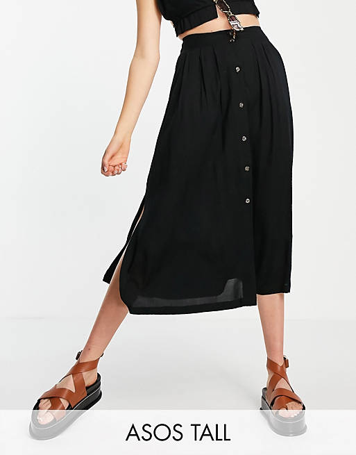  Tall button through midi skirt with deep pocket detail in black 