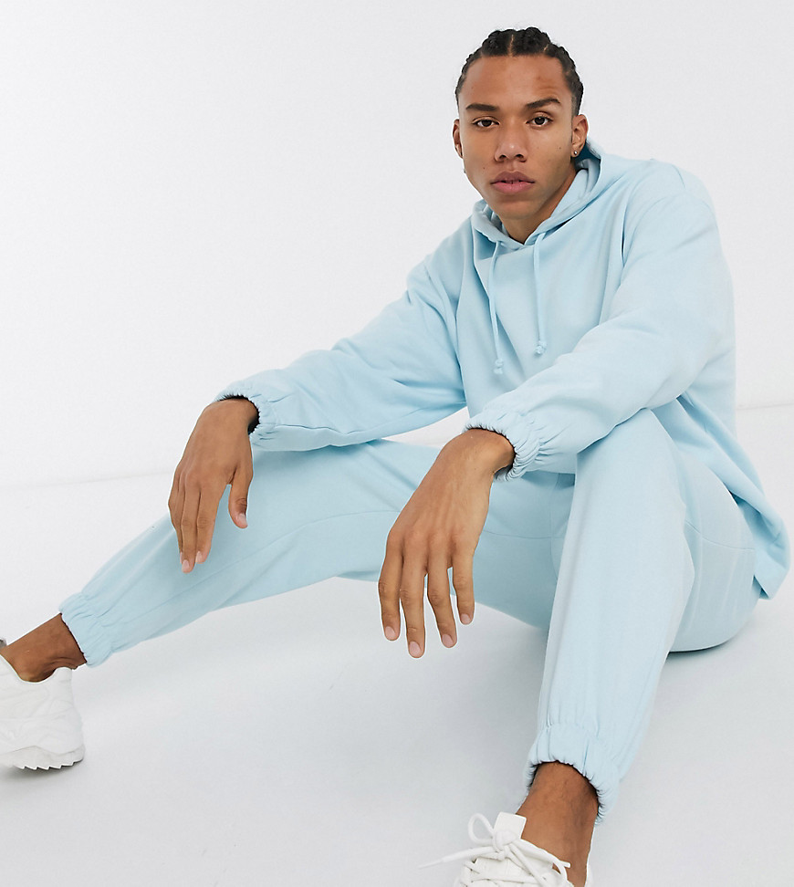 ASOS DESIGN Tall co-ord oversized hoodie with fixed hem in pastel blue with contrast stitch