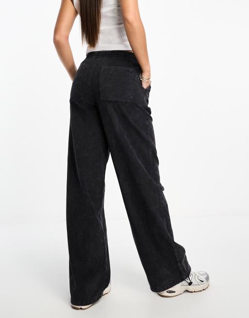 ASOS DESIGN Petite parachute cargo pants in black