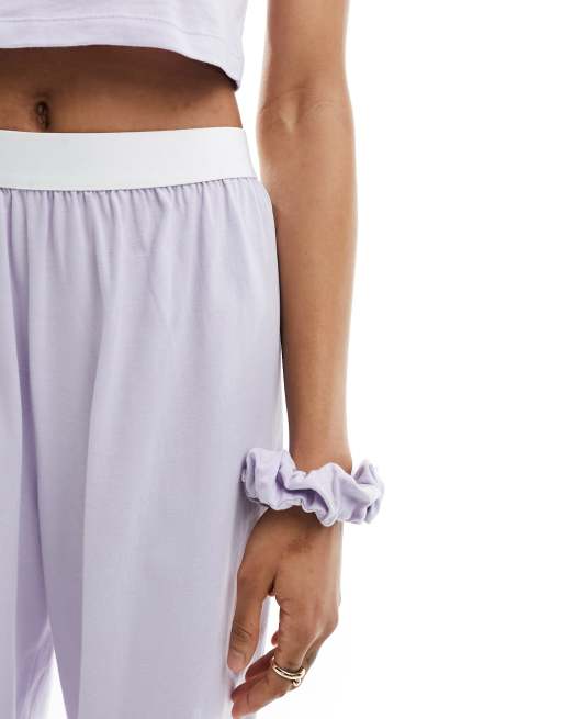 ASOS DESIGN Petite cotton pajama pants with exposed waistband and picot  trim in lilac