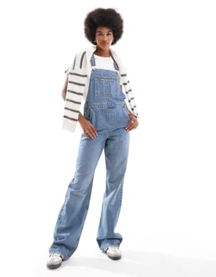 ASOS DESIGN Tall - Denim tuinbroek in middenblauw | ASOS