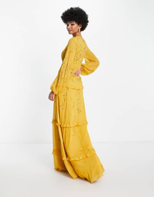 ASOS DESIGN shirred wrap tiered skirt maxi dress in mustard floral