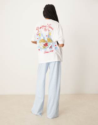ASOS DESIGN Tall - Ensemble de pyjama avec t-shirt oversize et pantalon ample à imprimé Breakfast Lovers-Blanc