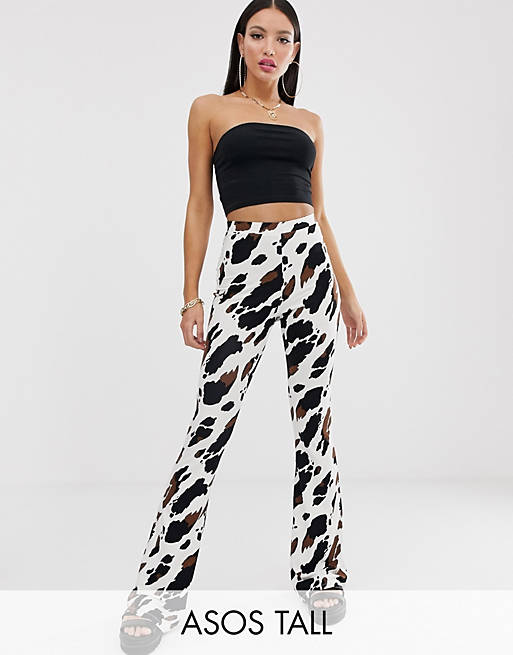 ASOS DESIGN Tall flare pants in cow print