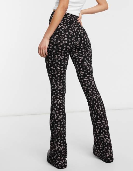 ASOS DESIGN Tall flare trouser in cow print